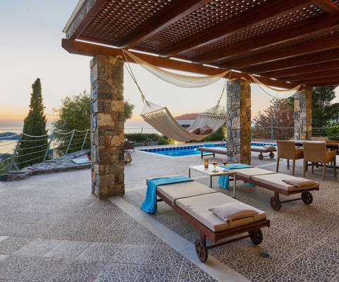 Okeanides Villas Crete Villa Kalypso sunbeds by the swimming pool